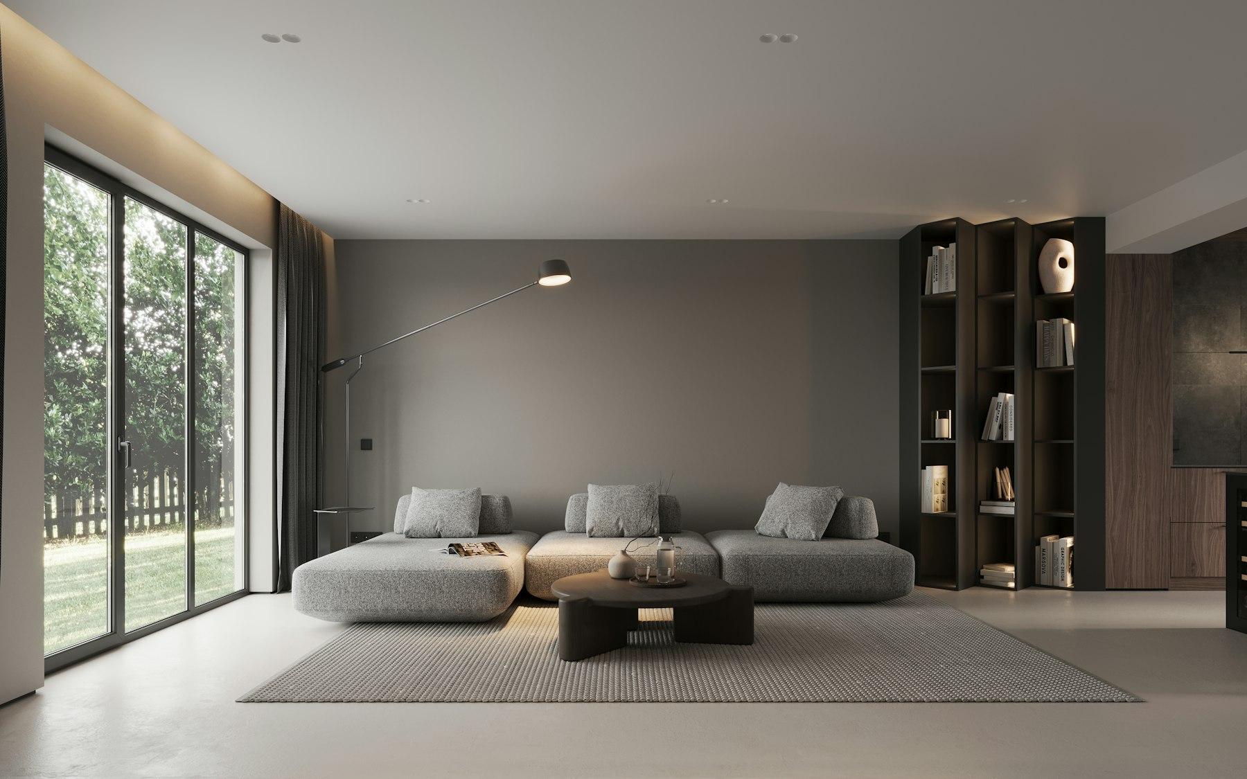 Modern living room with large window and neutral palette